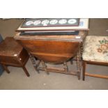 SMALL OAK OVAL DROP LEAF TABLE ON BARLEY TWIST LEGS