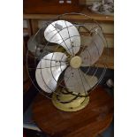 VINTAGE LIMIT ELECTRIC FAN AND A REVOLVING WOODEN TABLE STAND