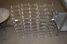 SET OF FIVE STAINLESS STEEL WINE RACKS