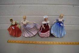 FOUR ROYAL DOULTON FIGURINES TO INCLUDE FIGURINES OF THE YEAR 2000 AND 2001