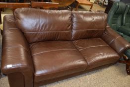 BROWN LEATHER THREE SEATER SOFA