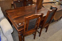 20TH CENTURY HARDWOOD RECTANGULAR DINING TABLE AND FOUR CHAIRS WITH MESHED METAL BACKS