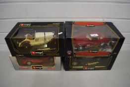 FOUR BOXED BURAGO TOY VEHICLES TO INCLUDE ALFA ROMEO SPIDER, MERCEDES BENZ 300 ETC