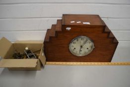 WOODEN CASED MANTEL CLOCK AND A BOX CONTAINING CLOCK MECHANISMS