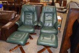 PAIR OF BD GREEN LEATHER REVOLVING ARMCHAIRS AND ACCOMPANYING FOOTSTOOLS (4)