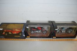 TWO BOXED MAISTO MODEL MOTORBIKES AND A FURTHER FERRARI FORMULA 1 CAR