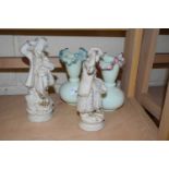 TWO FRILLED GLASS VASES AND A PAIR OF FIGURINES (4)