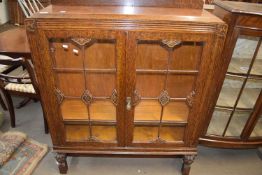 EARLY 20TH CENTURY OAK BOOKCASE CABINET WITH GLAZED DOORS