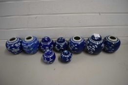 COLLECTION OF CHINESE PRUNUS PATTERN GINGER JARS, SLIGHTLY DIFFERING DESIGNS AND SIZES