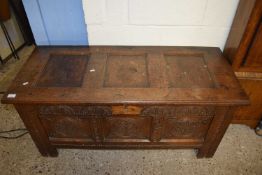 18TH CENTURY OAK COFFER WITH CARVED PANELLED FRONT, 122CM WIDE