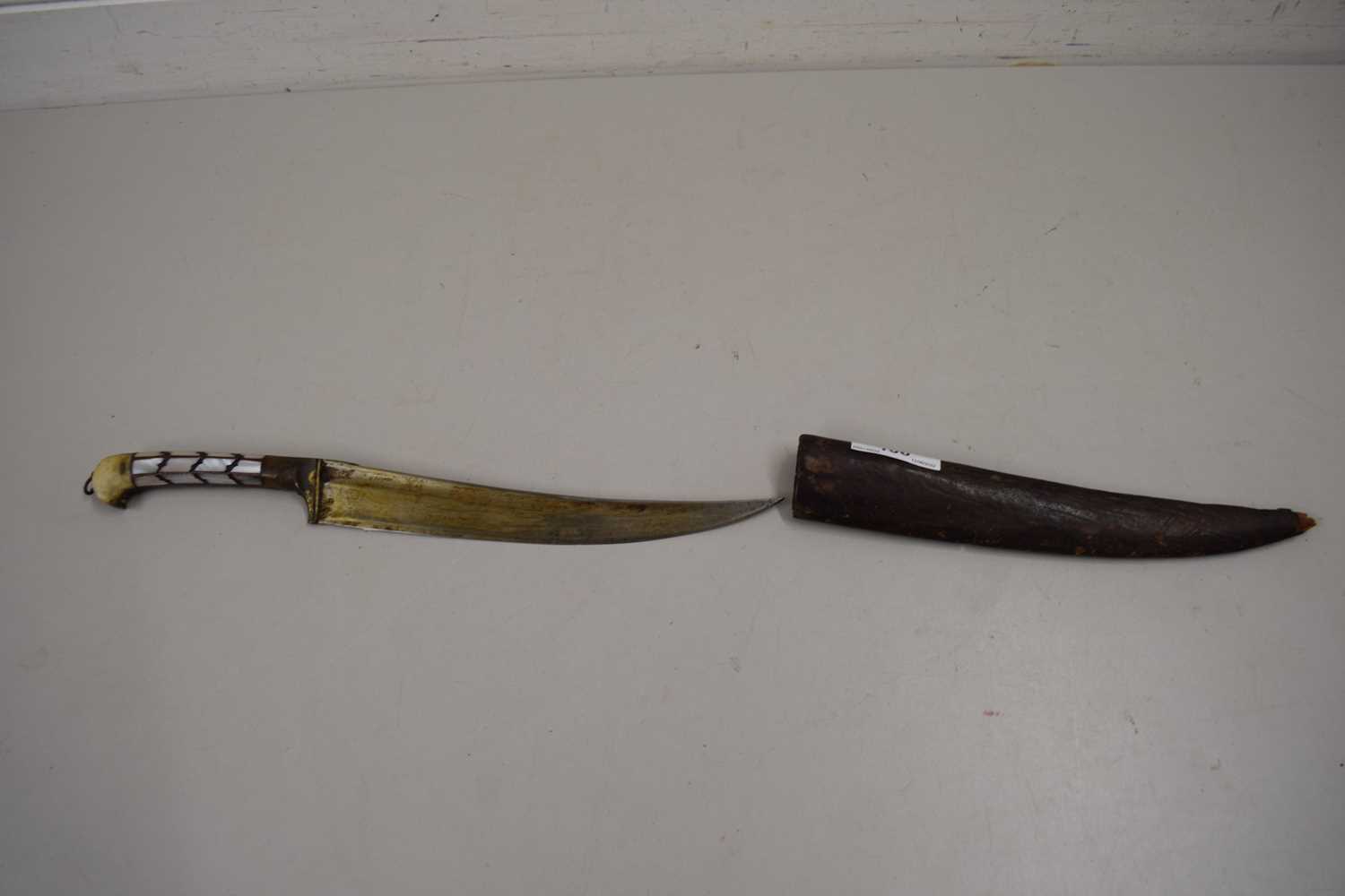 SMALL EASTERN DAGGER WITH MOTHER OF PEARL INLAID HANDLE AND LEATHER SHEATH