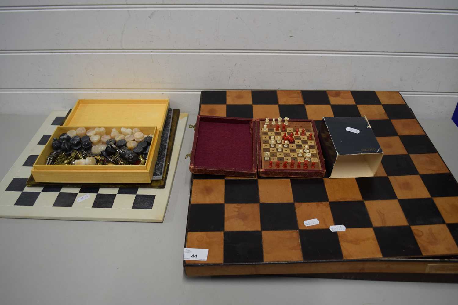 MODERN METAL CHESS SET IN FITTED CASE TOGETHER WITH FURTHER MODERN BRASS AND POLISHED STONE CHESS