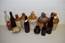 VARIOUS MIXED STONEWARE AND GLASS BOTTLES AND FLAGONS TO INCLUDE SOME LOCAL INTEREST