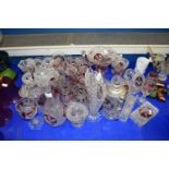 COLLECTION OF MODERN CONTINENTAL CLEAR AND RUBY GLASS DRINKING GLASSES, VASES, BOWLS, DECANTERS