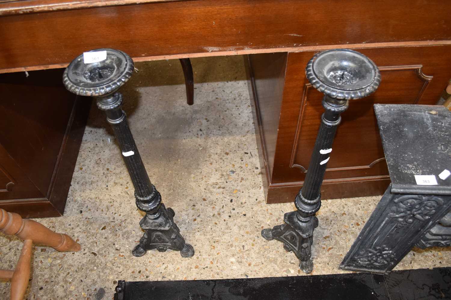 PAIR OF BLACK CAST IRON LARGE CANDLESTICKS, 69CM HIGH