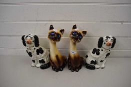 PAIR OF STAFFORDSHIRE DOGS AND A PAIR OF POTTERY CATS (4)