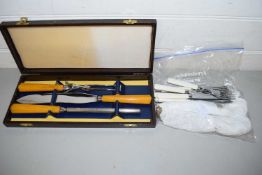 CASED CARVING SET TOGETHER WITH A QUANTITY OF CUTLERY