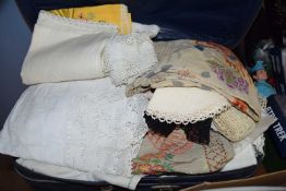 SUITCASE OF VARIOUS LINENS