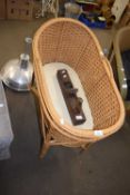 WICKER COT AND A WOODWORKING PLANE