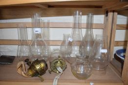 COLLECTION OF OIL LAMP CHIMNEYS AND FITTINGS