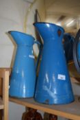 TWO BLUE ENAMEL JUGS