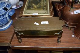 BRASS CRIBBAGE BOARD WITH HINGED LID AND RAISED ON SHORT LEGS