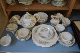 QUANTITY OF STAFFORDSHIRE TEA WARES DECORATED WITH PINK FLOWERS