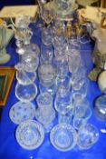 VARIOUS DECANTERS, DRINKING GLASSES ETC