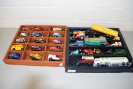 TWO DISPLAY CASES CONTAINING A RANGE OF MIXED TOY VANS AND LORRIES