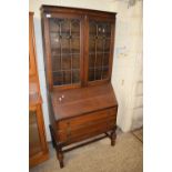 EARLY 20TH CENTURY OAK BUREAU BOOKCASE WITH LEAD GLAZED TOP SECTION