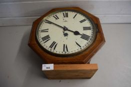 EARLY 20TH CENTURY WALL CLOCK IN OCTAGONAL OAK CASE