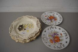 COLLECTION OF FLORAL DECORATED PLATES