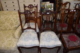 THREE EDWARDIAN MAHOGANY FRAMED DINING CHAIRS WITH FABRIC UPHOLSTERED SEATS