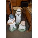 THREE PAINTED CONCRETE GARDEN ORNAMENTS OF CRICKETING INTEREST