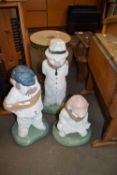 THREE PAINTED CONCRETE GARDEN ORNAMENTS OF CRICKETING INTEREST