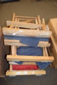 FOUR FOLDING WOODEN FRAMED CHAIRS