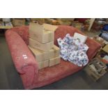 RED UPHOLSTERED TWO-SEATER SOFA