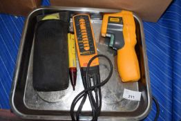 Tray containing a Fluke infra-red thermometer, electrical tester and a voltage detector