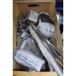 Box containing mixed chrome shower heads and shower risers, hoses etc