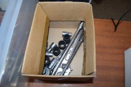 Box containing mixed sockets and spanners, impact sockets etc