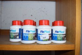 Nine bottles of Floplast solvent cement