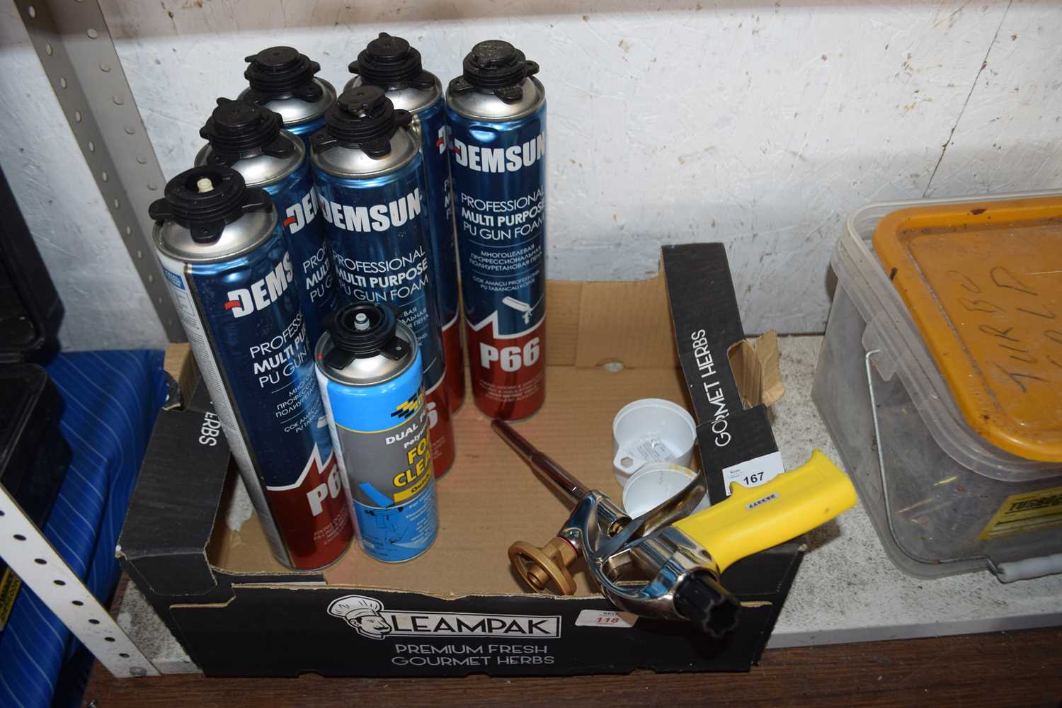 Box containing a multi-purpose PU foam gun with foam cartridges