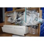 Box containing bathroom and sink waste plugs, connectors etc
