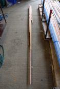 Bundle of mixed copper pipes of varying lengths and diameters