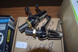 Pair of basin lever taps