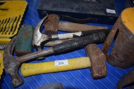 Three lump hammers and two claw hammers