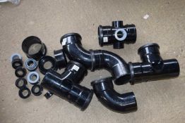 Quantity of 110mm black drainage joins to include branch fittings, bospipe etc