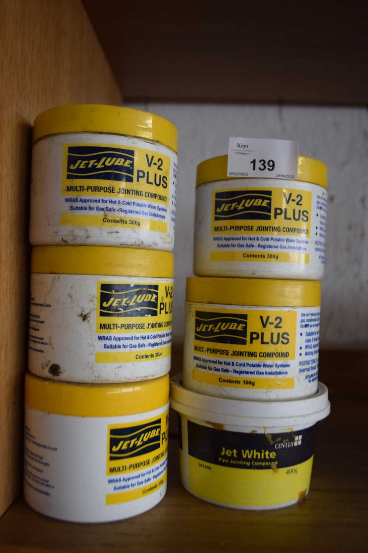 Six tubs of Jetwhite pipe jointing compound