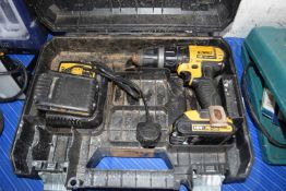 De Walt combi drill with two batteries and a charger model no DCD785