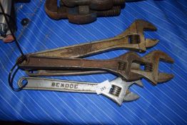 Four adjustable spanners